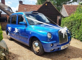 Blue London Taxi for weddings in Hastings