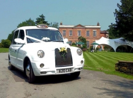 Classic White Taxi for weddings in Stockport