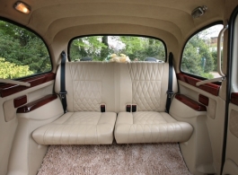 Ivory White London taxi for weddings in Canary Wharf