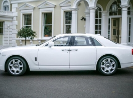Modern White Rolls Royce wedding car in Egham