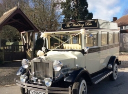 Ivory and Black vintage wedding transport in Croydon