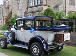 White vintage wedding car in Nottinghamshire