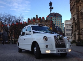 White London cab for weddings in Manchester